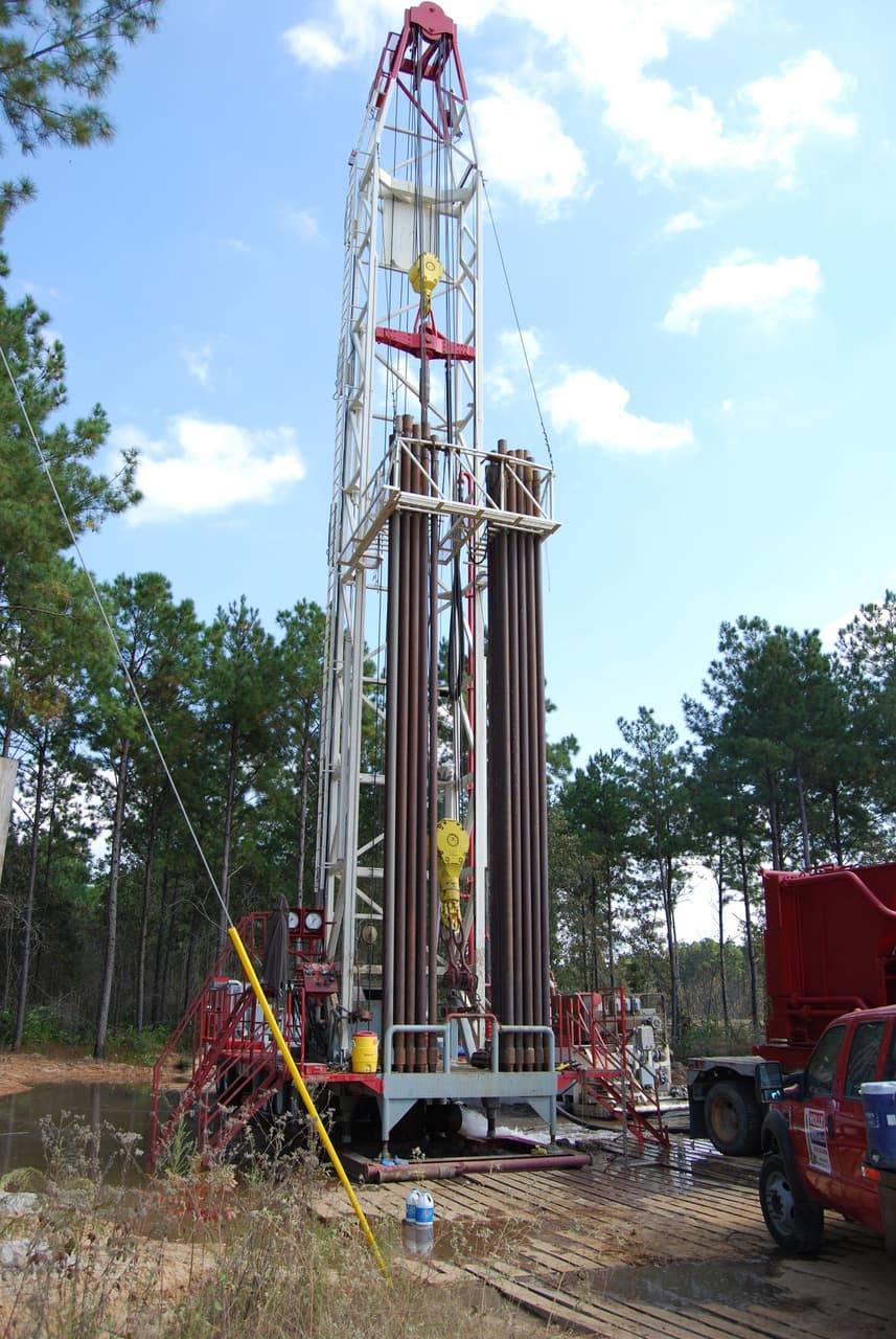 Holly Water Wells drilling rig set up on an East Texas property near Huntsville, Texas